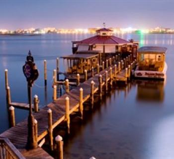 Sunset aerial view of Sneaky Pete's Photo