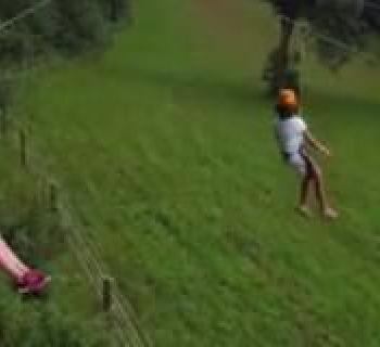 Zip lining at River Valley Ranch Photo