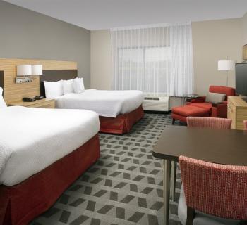 Guest room at TownePlace Suites Photo
