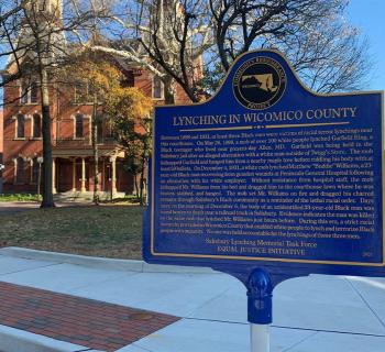 Lynching in Wicomico County Historic Marker - blue with gold outline and writing.  Photo