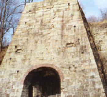 Entrance to stone blast furnace Photo