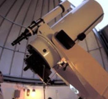 Scientist and Telescope Photo
