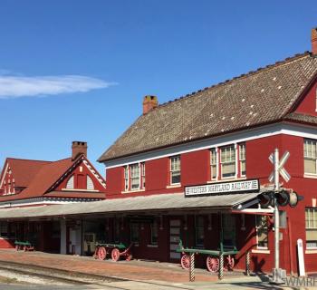 historic red railway building Photo