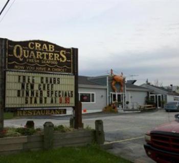 Sign outside of Crab Quarters. Photo