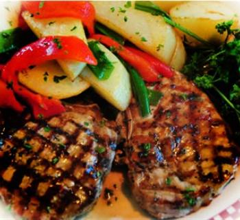 Grilled Pork Chops, mixed vegetables and broccoli Photo