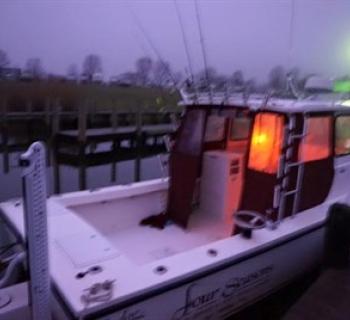 Four Seasons Guide Service fishing boat Photo