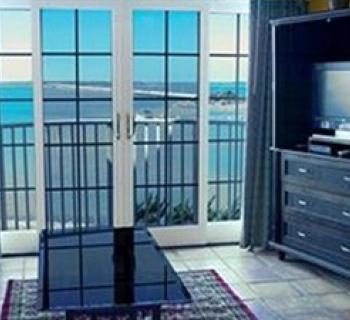 View of Bay from living toom of the Coconut Malorie Resort Photo