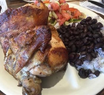 1/2 chicken with cucumber salad and rice-n-beans from Don Pollo Photo