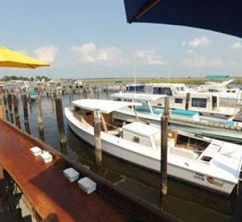 Boats docked in a pier at Goose Bay Marina & Campground Photo