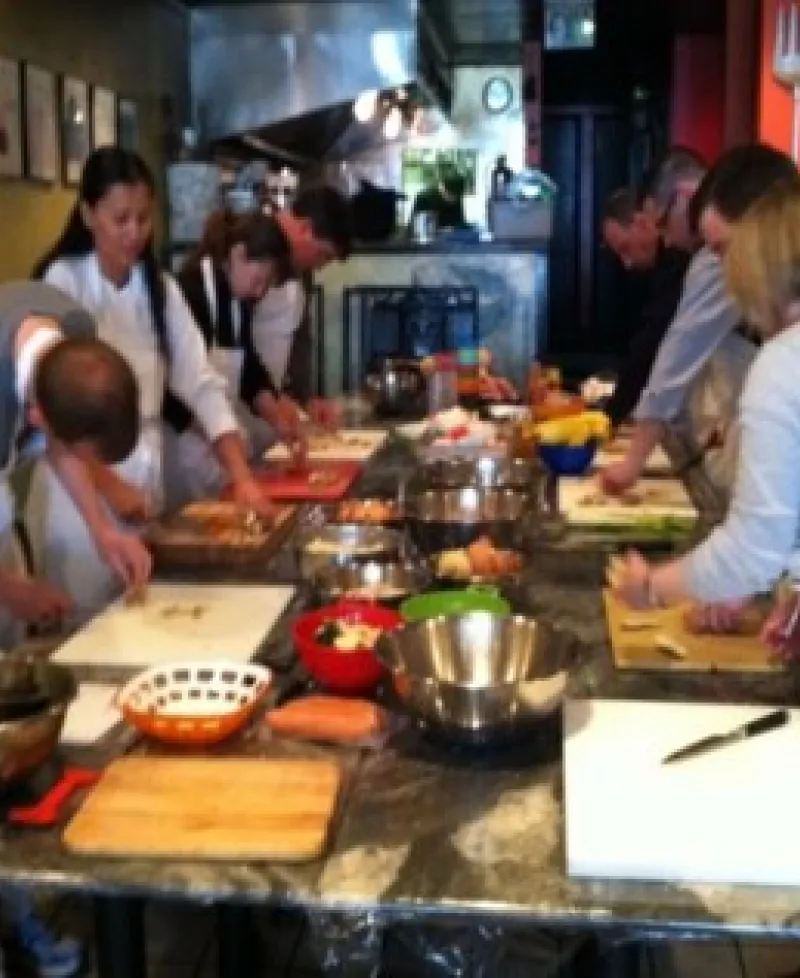 People cooking at Pierpoint Cooking Class. Photo