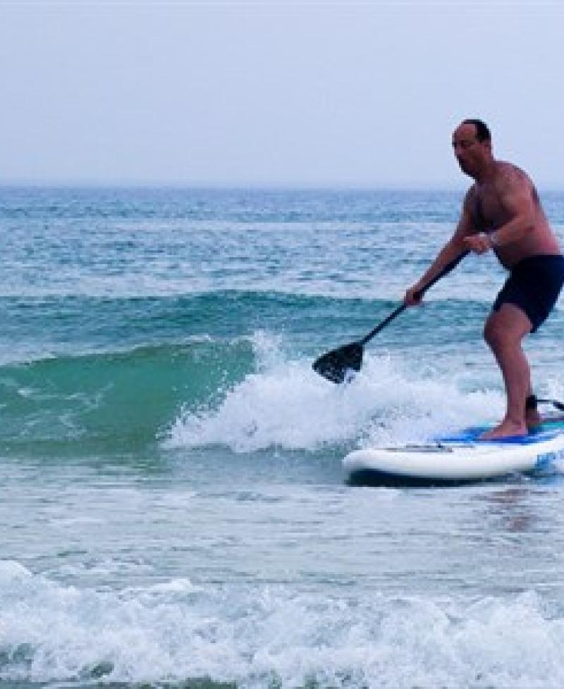 Stand up paddleboarding Photo