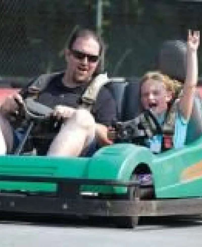 Father and son go-karting at Grand Prix Amusements Photo