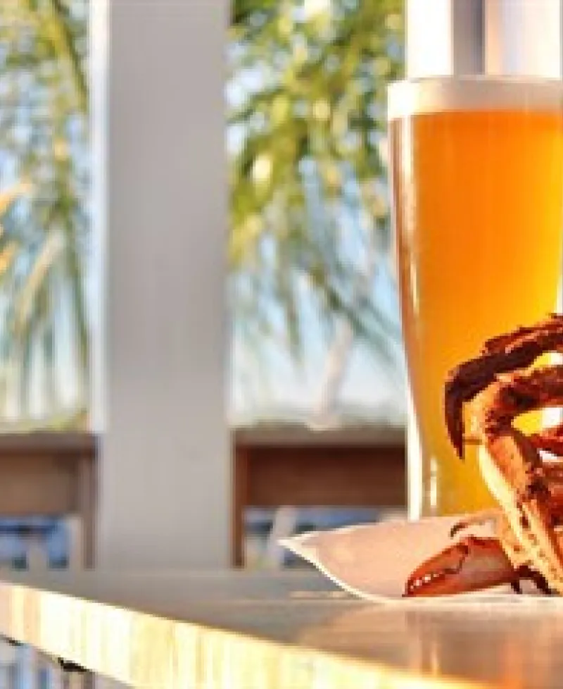 Enjoy delicious dishes, cocktails and views of Rock Hall Harbor at Admirals Club Beachside Bar. Photo