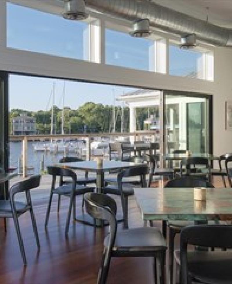 Interior view of waterfront dining room. Photo