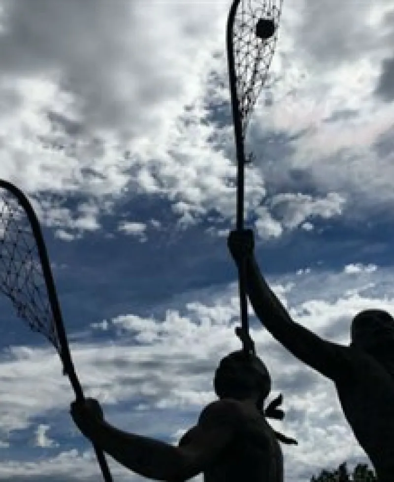 Statue of Native Americans playing LAX Photo