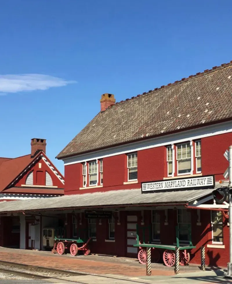 historic red railway building Photo