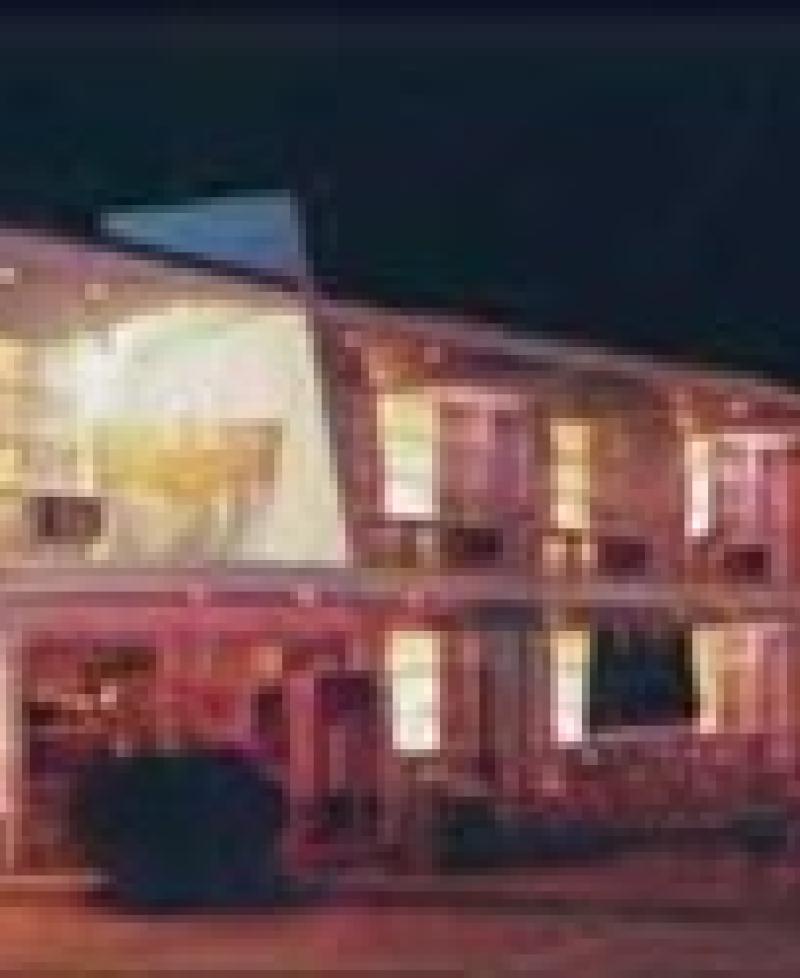 Eden Roc Motel night exterior Photo