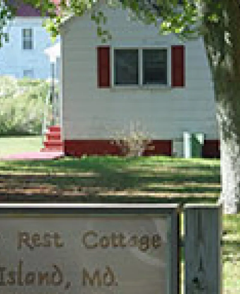 Fishermen's Rest Cottage with Sign Photo