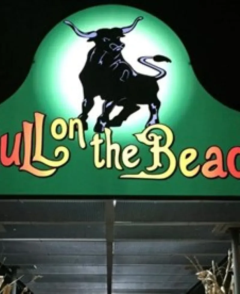 Bull on the Beach sign over the doors beckons diners Photo