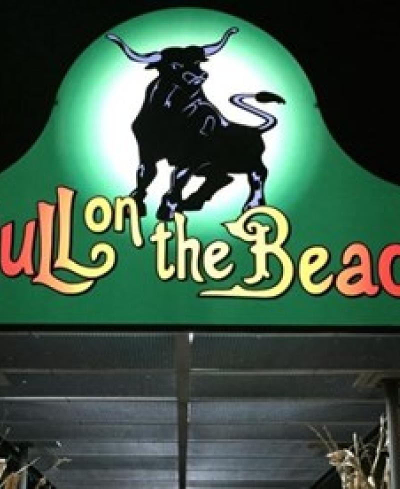 Bull on the Beach sign over the doors beckons diners Photo