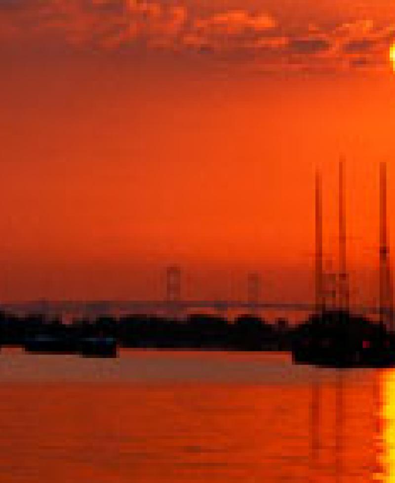 sunset on the water photo Photo