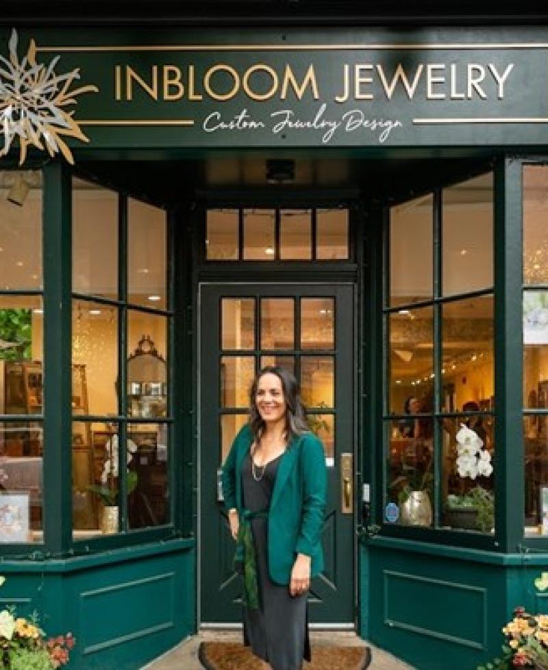 Founder Stacey Krantz at InBloom Jewelry's brick and mortar location on East Patrick Street.  Photo