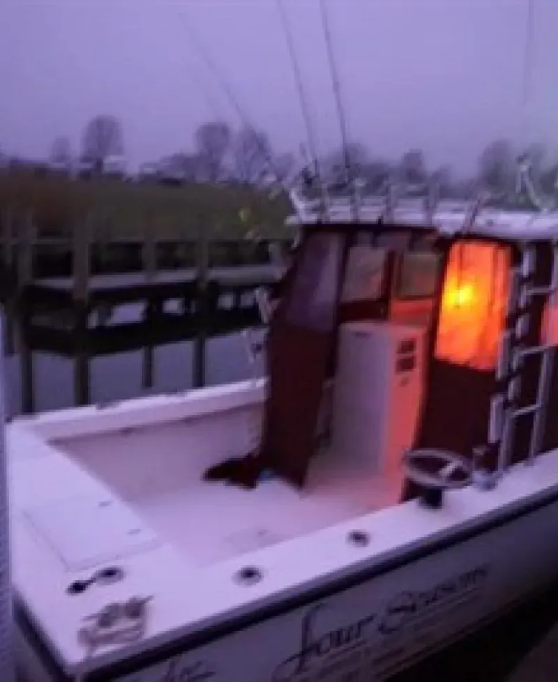 Four Seasons Guide Service fishing boat Photo