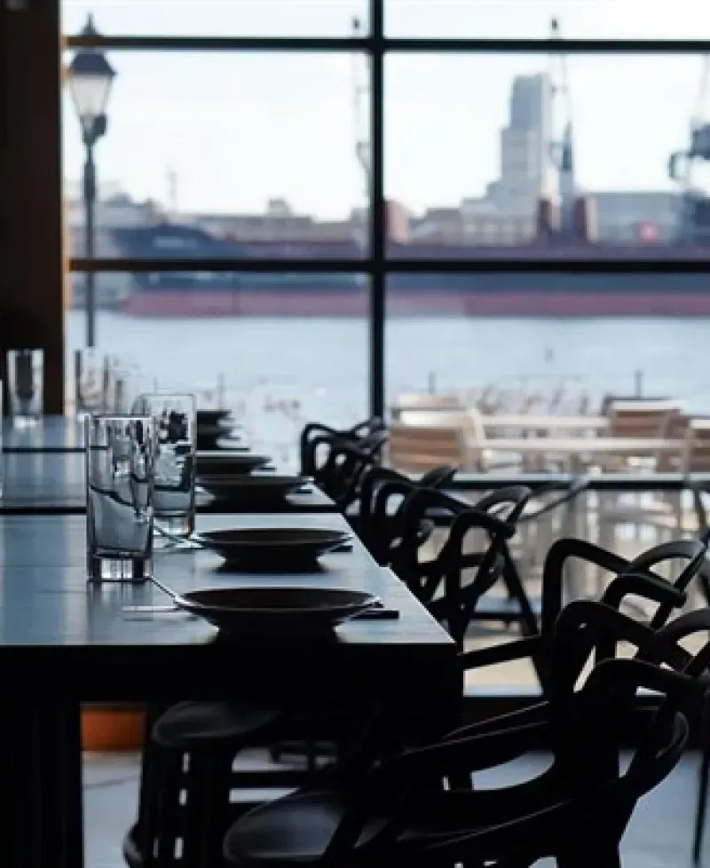 Waterfront view dining area at Ampersea Restaurant Photo