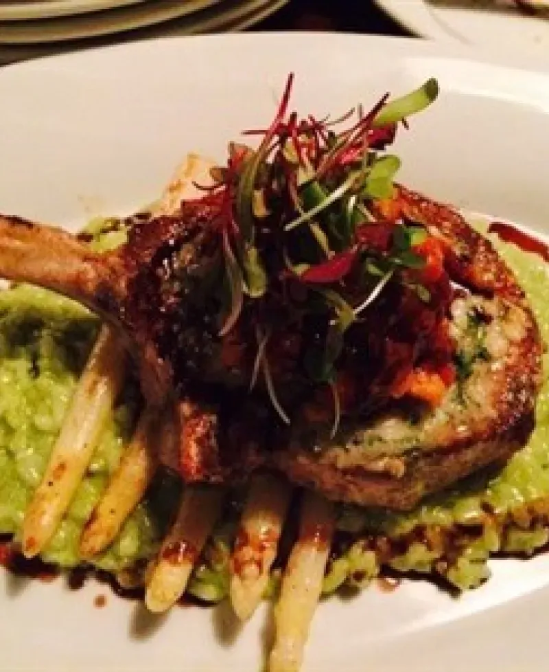 Steak over asparagus and rissoto Photo