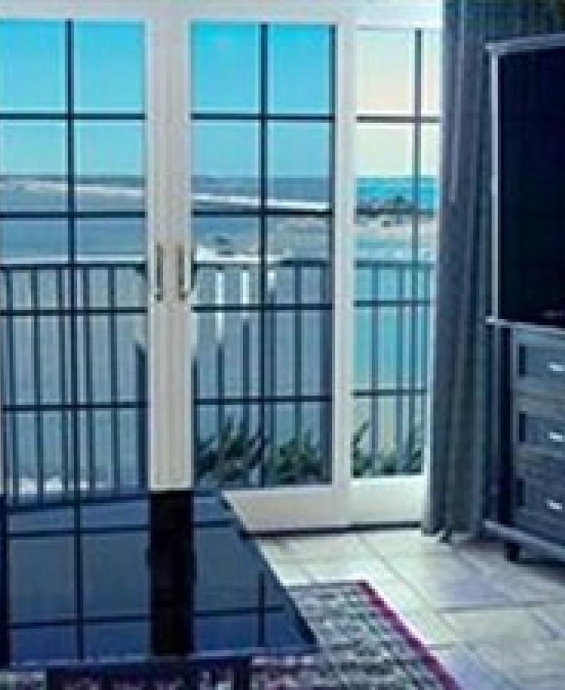 View of Bay from living toom of the Coconut Malorie Resort Photo
