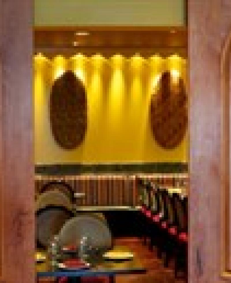 Doors opening to the Latin Grill Photo