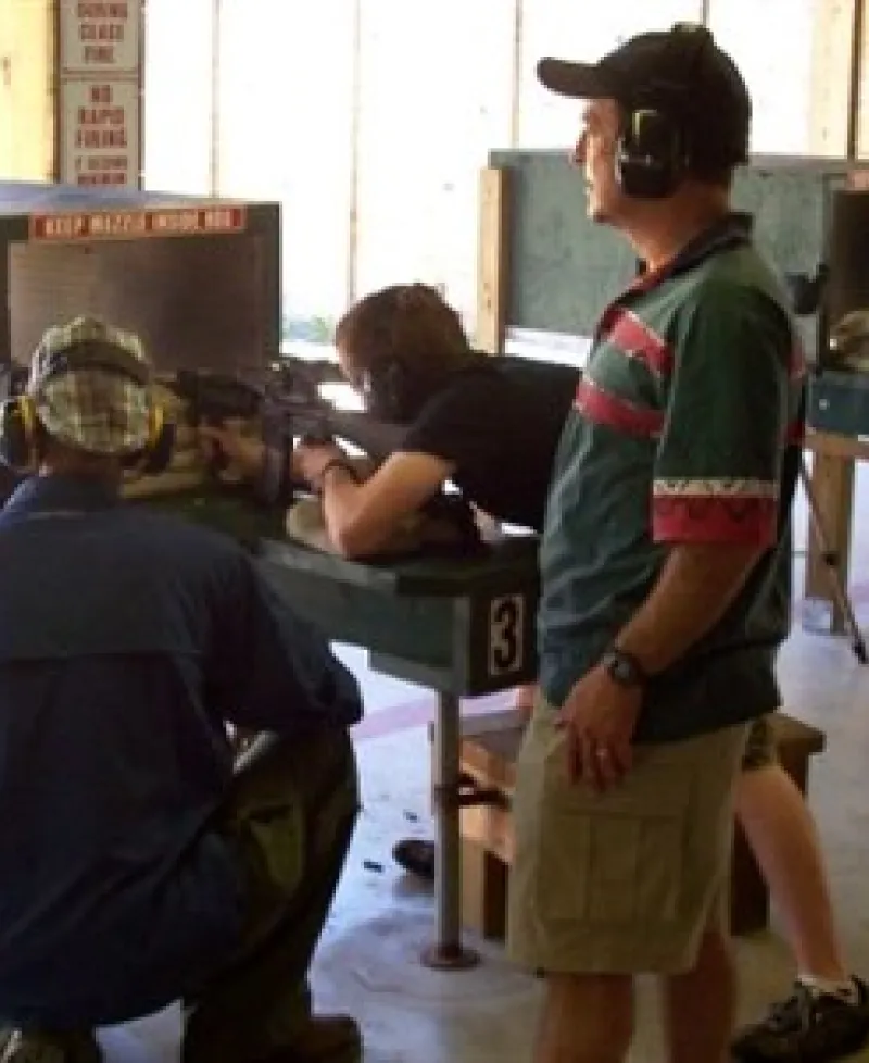 Shooters at the shooting range. Photo