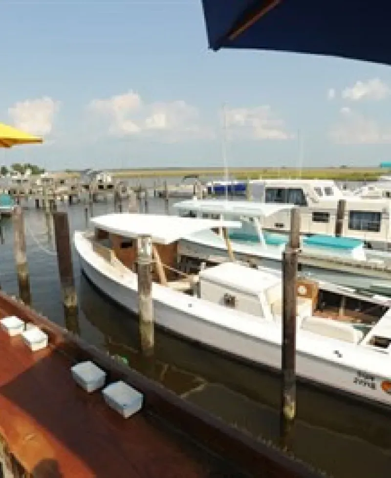 Boats docked in a pier at Goose Bay Marina &amp; Campground Photo