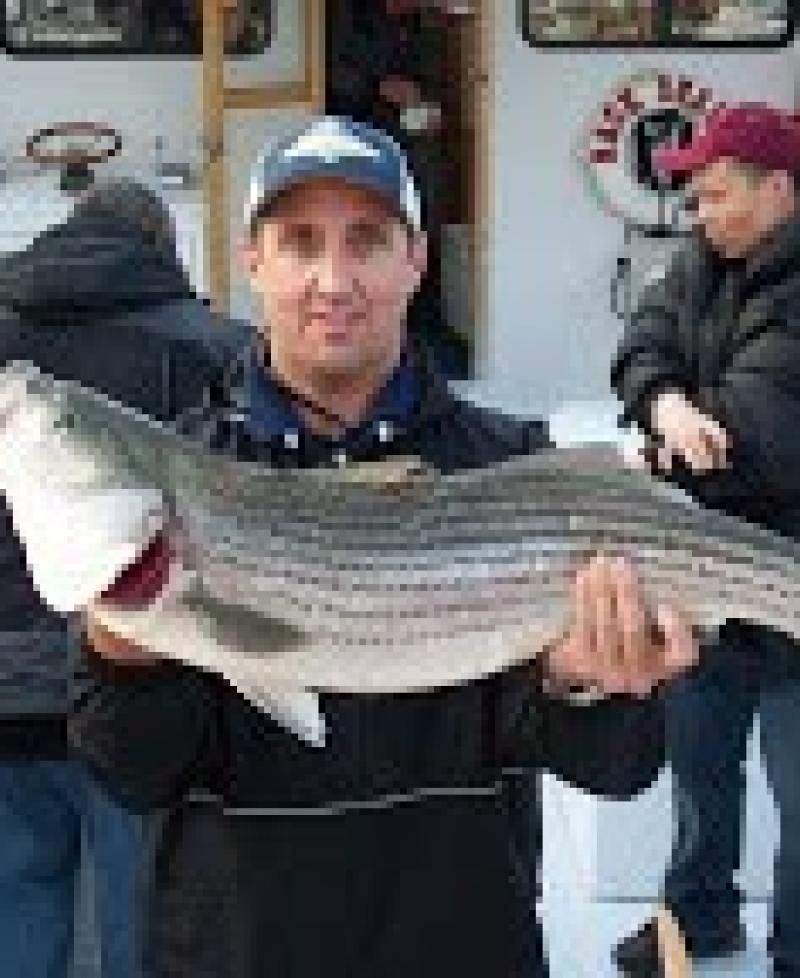 Charles Sisson Charter fisherman with large catch Photo