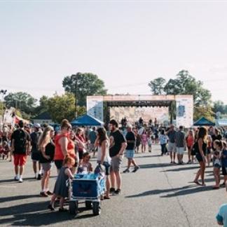 People at an outdoor festival Photo