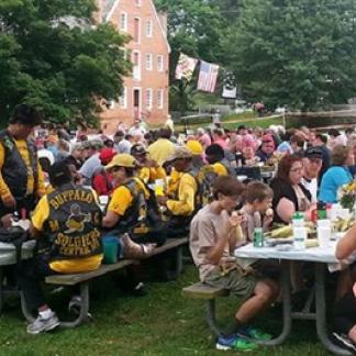 People enjoying all the corn they can eat! Photo