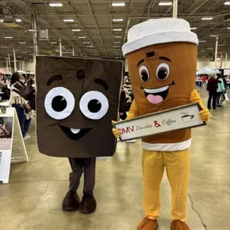 Meet Chunk the chocolate bar and Bean the coffee cup for complimentary photos! Photo