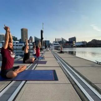 Yoga on a dock Photo