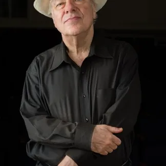 musician in white hate Photo