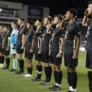 Players standing in a line Photo