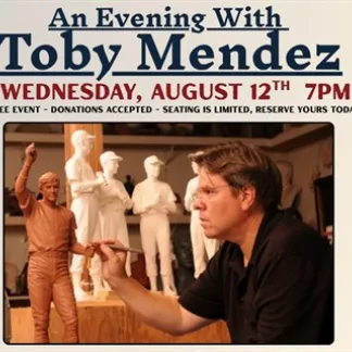 Toby Mendez sculpting a maquette for one of his projects. Photo