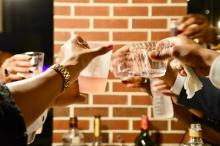 Men and women socializing Photo