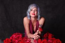 Storm Large in a red dress Photo