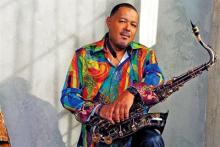 Najee holding saxophone Photo