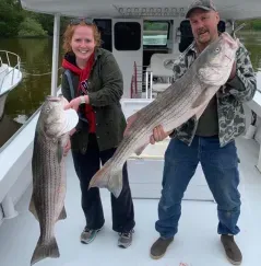 Father and daughter on fishing boat
