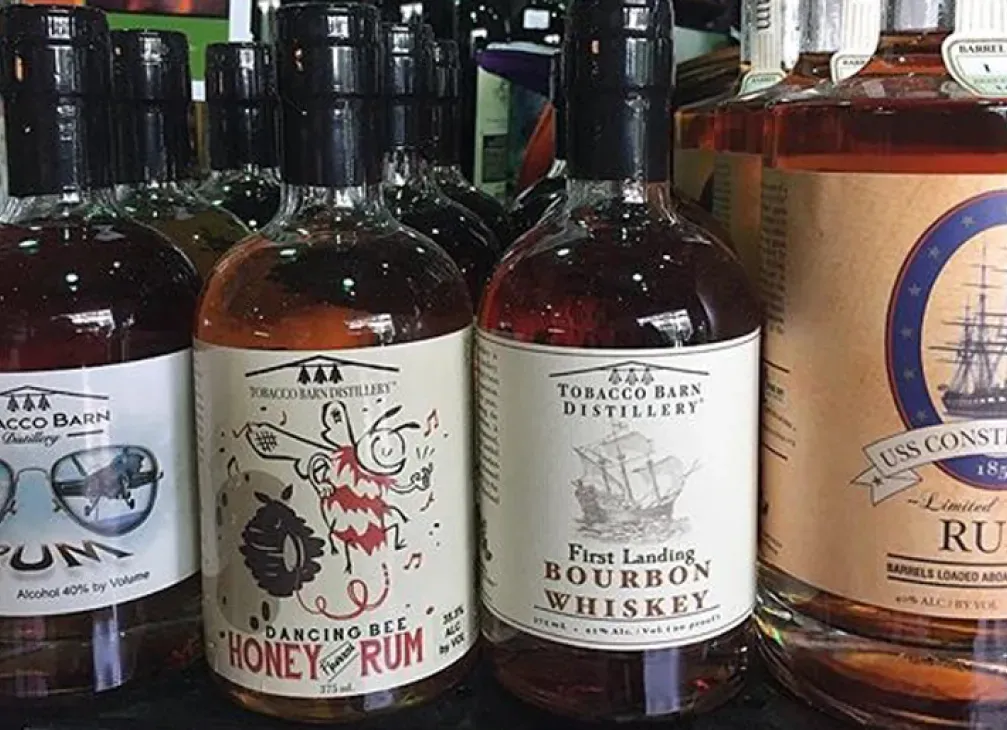 4 bottles of Tobacco Barn Distilling product